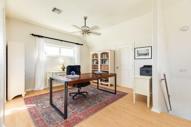 office area with ceiling fan, vaulted ceiling, and light wood-type flooring