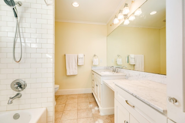 full bathroom with toilet, tiled shower / bath, ornamental molding, vanity, and tile patterned flooring