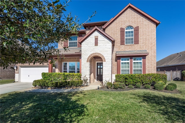 view of front of house with a garage and a front yard