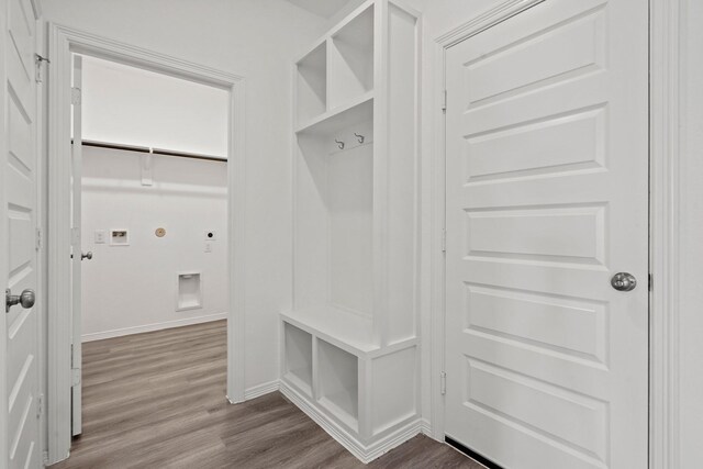 mudroom with wood-type flooring