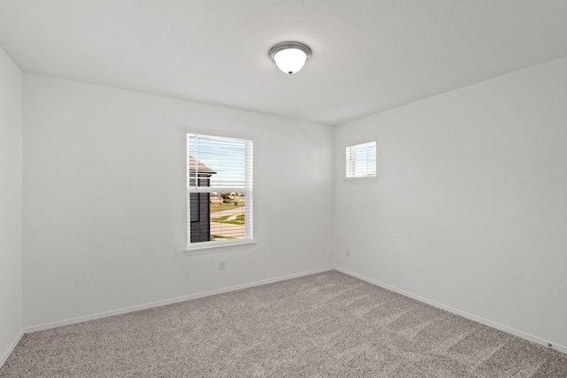 empty room featuring carpet