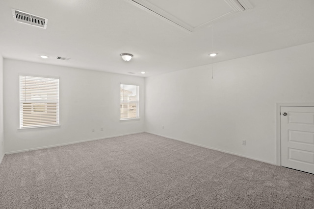 view of carpeted spare room