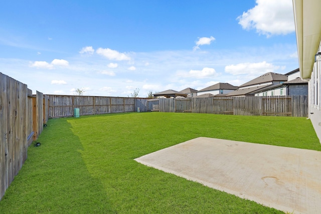 view of yard with a patio area