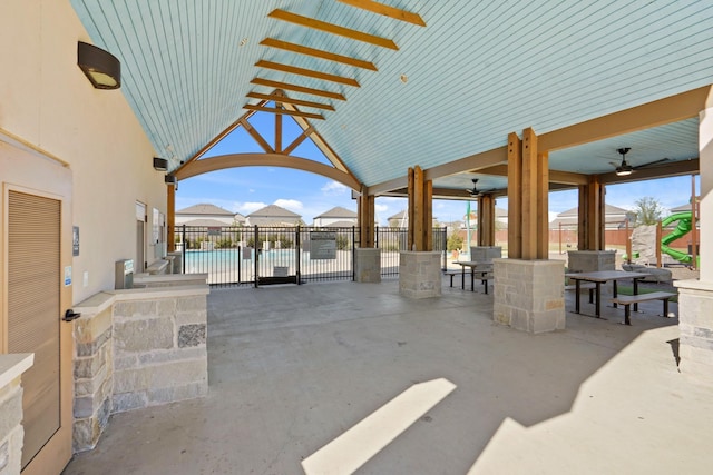 view of patio / terrace with a community pool and ceiling fan