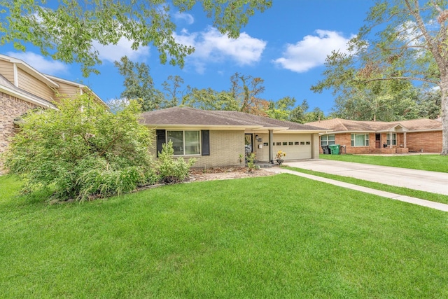 ranch-style home featuring a garage and a front yard