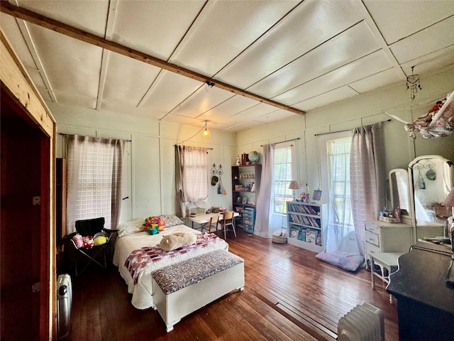 bedroom featuring dark wood-type flooring