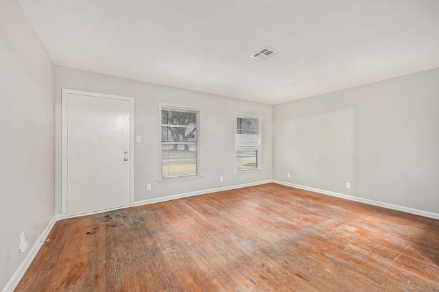 unfurnished room featuring light wood-type flooring