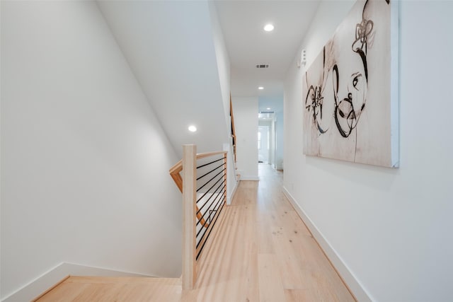 corridor featuring light wood-type flooring