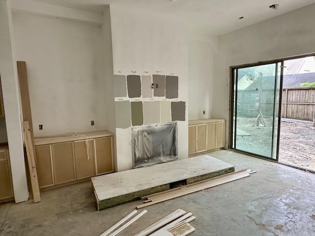 2434 Quenby St, Houston, TX 77005 - unfurnished living room featuring unfinished concrete floors