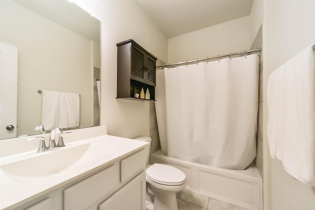 full bathroom with tile patterned flooring, vanity, toilet, and shower / bath combo with shower curtain