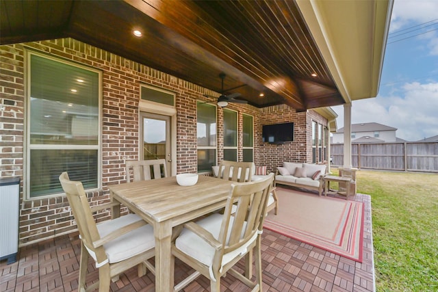 view of patio featuring outdoor lounge area and ceiling fan