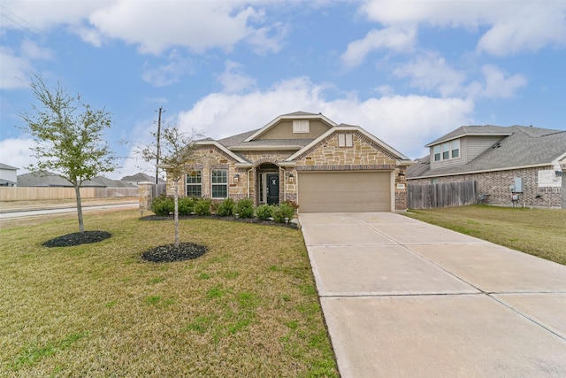 view of front of house with a garage and a front lawn