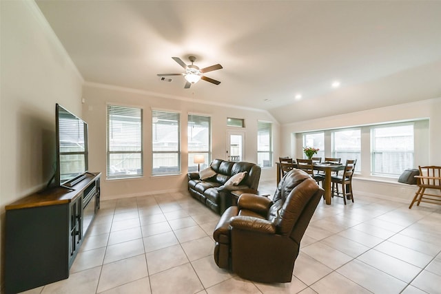 tiled living room with crown molding, ceiling fan, and lofted ceiling