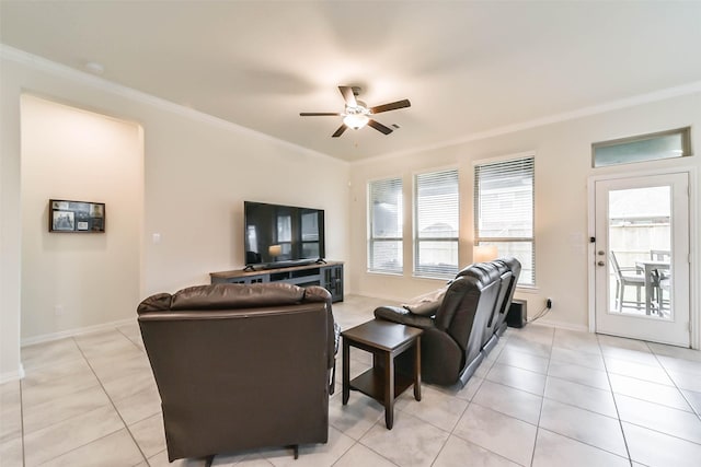 tiled living room featuring crown molding and ceiling fan