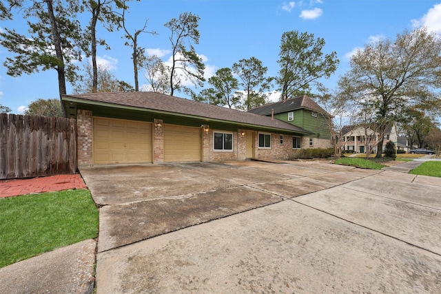 single story home with a garage