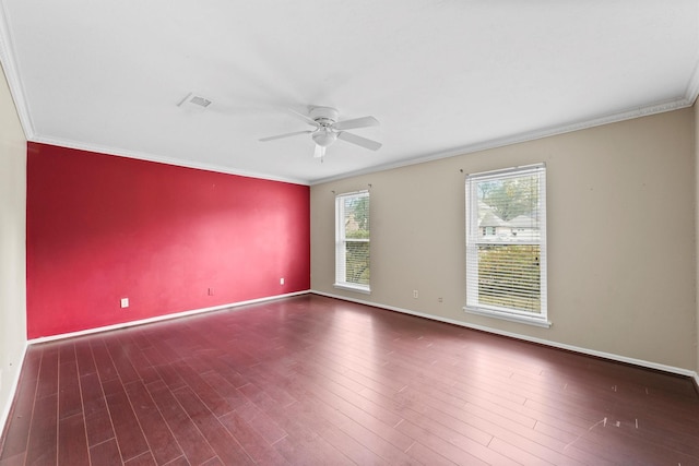 unfurnished room featuring ornamental molding, dark wood-type flooring, and ceiling fan