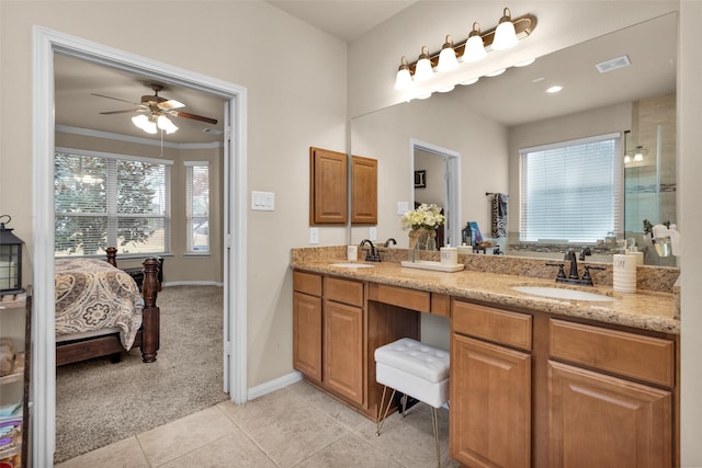 bathroom with tile patterned flooring, vanity, ornamental molding, and ceiling fan