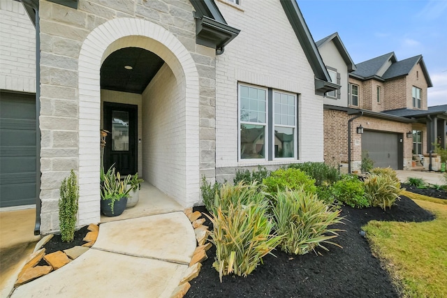 property entrance with a garage