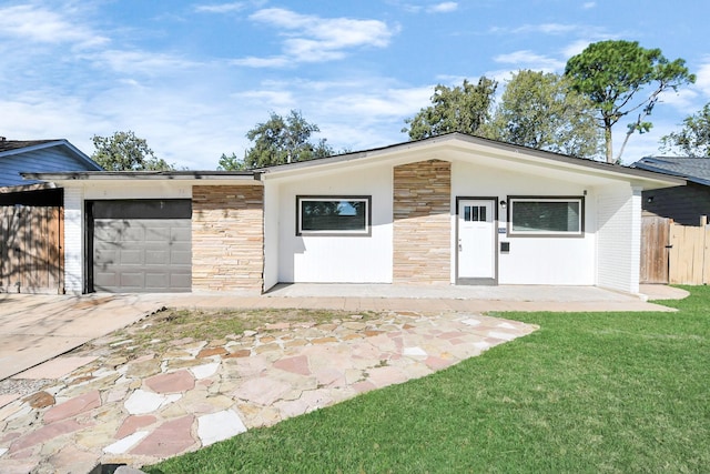 garage featuring a yard