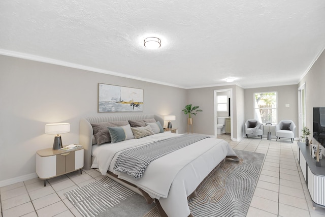 bedroom featuring connected bathroom, light tile patterned floors, ornamental molding, and a textured ceiling