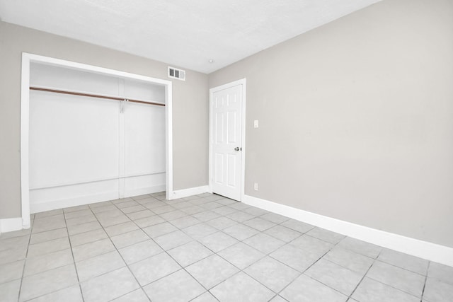 unfurnished bedroom featuring a closet