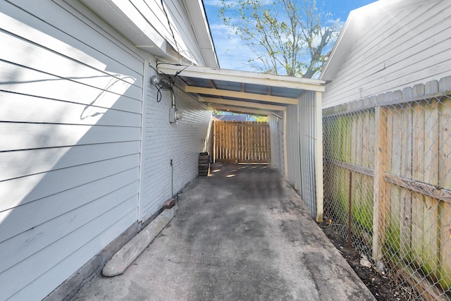 view of patio / terrace featuring a carport