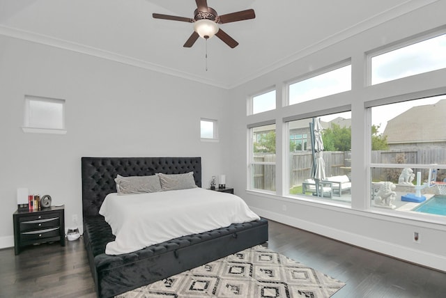 bedroom with ceiling fan, ornamental molding, and dark hardwood / wood-style floors