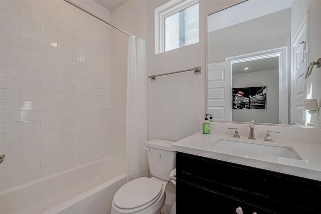 full bathroom with vanity, toilet, and shower / bath combo