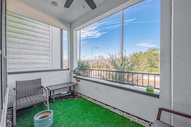 interior space featuring ceiling fan