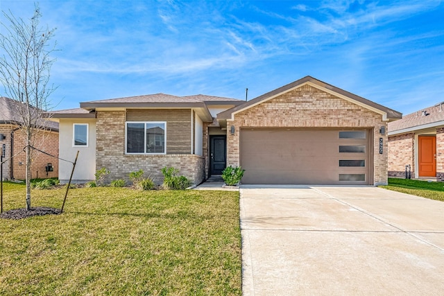 view of front of house with a garage and a front yard