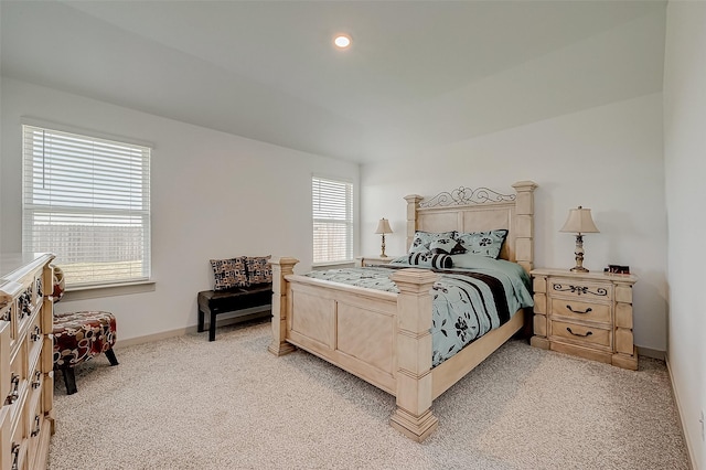 bedroom with light colored carpet