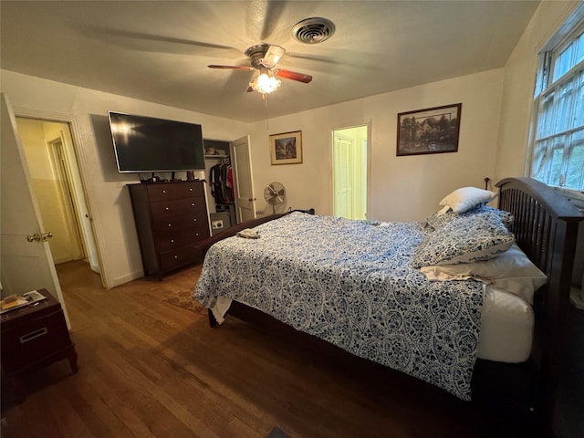 bedroom with hardwood / wood-style floors and ceiling fan