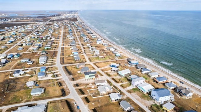 drone / aerial view with a view of the beach and a water view