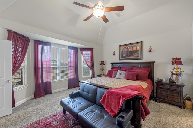 carpeted bedroom featuring vaulted ceiling and ceiling fan