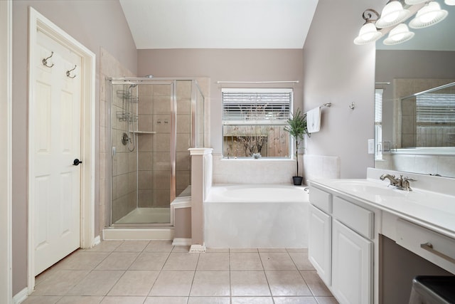 bathroom with vanity, plus walk in shower, and tile patterned flooring