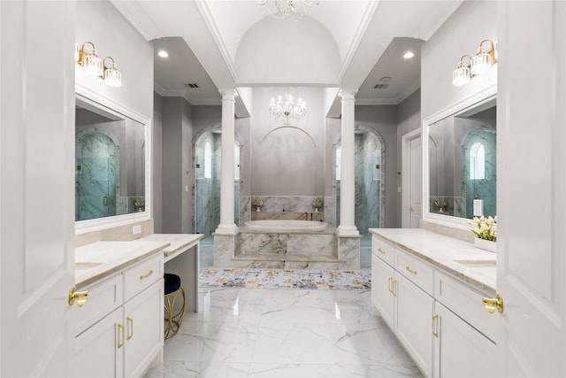 bathroom featuring plus walk in shower, decorative columns, ornamental molding, vanity, and an inviting chandelier