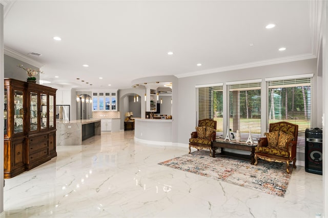 interior space with crown molding