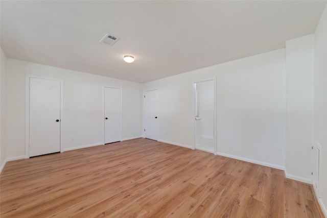 empty room featuring light wood-type flooring