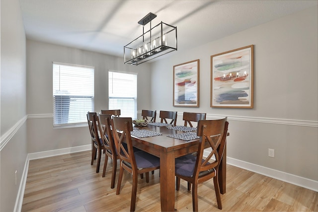 dining area with light hardwood / wood-style flooring