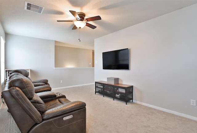 living room with light colored carpet and ceiling fan