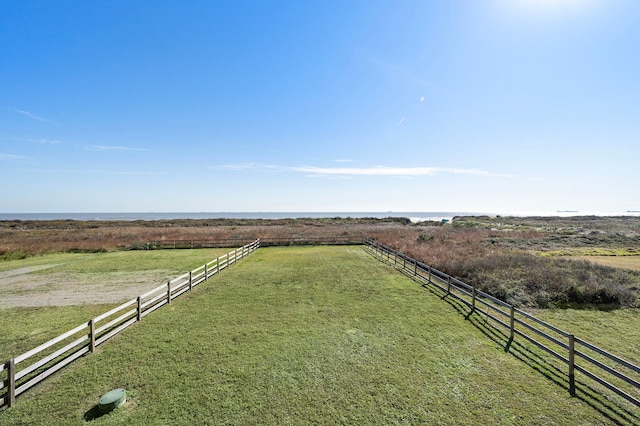 view of yard with a rural view