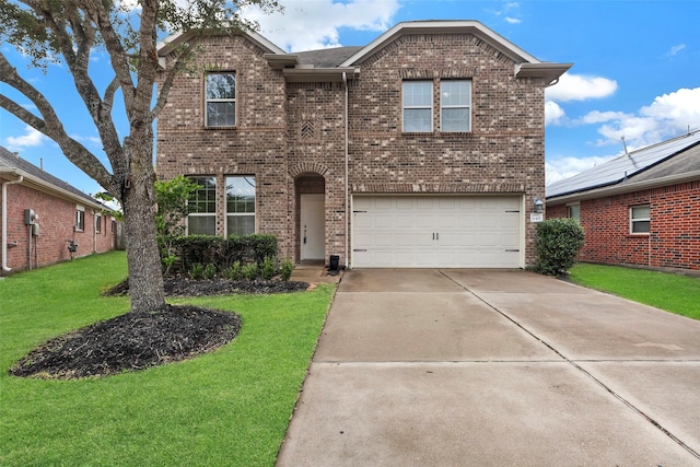 front of property with a garage and a front yard