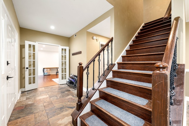 foyer entrance featuring french doors