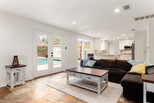 living room featuring french doors