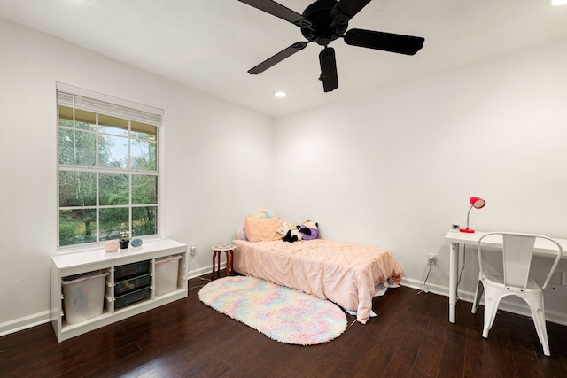 bedroom featuring dark wood-type flooring and ceiling fan