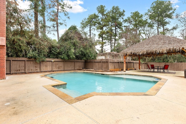 view of pool featuring a gazebo and a patio