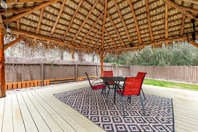 wooden deck featuring a gazebo