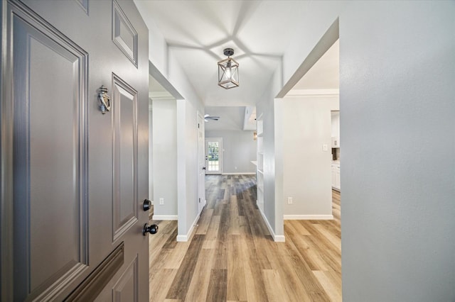 hall with light hardwood / wood-style floors