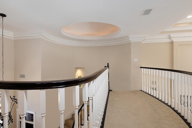 hall with crown molding and carpet flooring