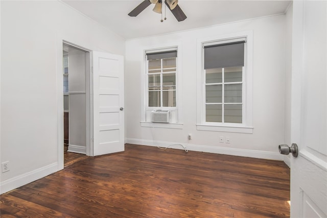 unfurnished room with dark hardwood / wood-style flooring, cooling unit, and ceiling fan